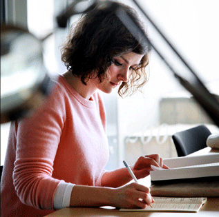 Photograph of a student writing